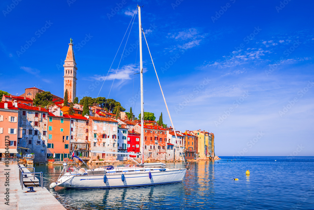 Rovinj, Croatia. Old town harbor, sunny day with blue sky. Adriatic Sea, Dalmatia coastline, Istria.