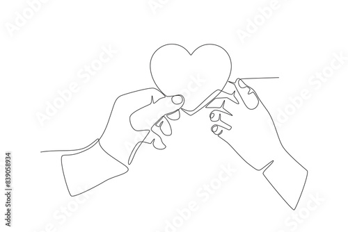 The hand that surrenders the heart. Organ donation day concept one-line drawing