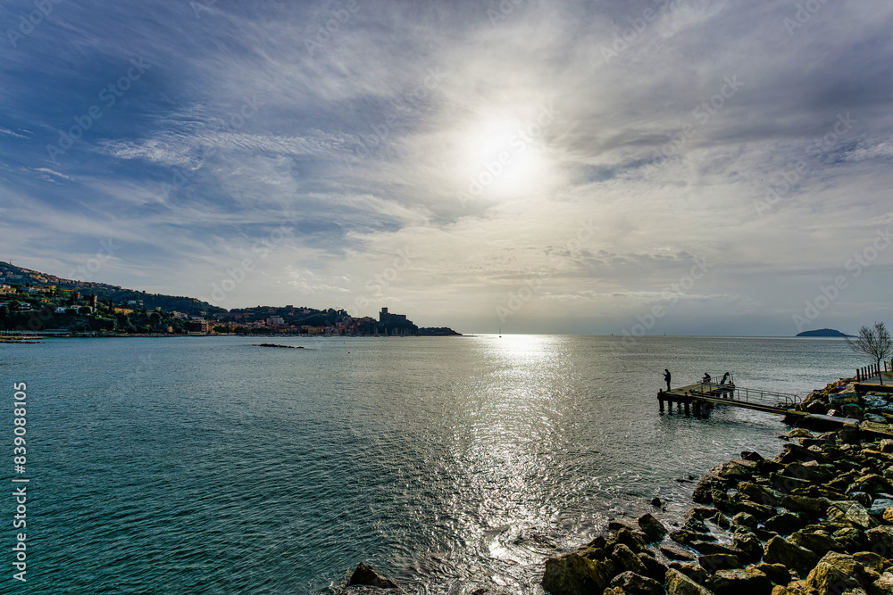 Φωτογραφία Panorama against the sun at sunset of the Gulf of Lerici La Spezia Italy