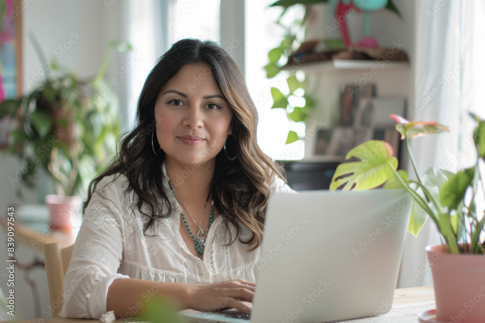 a Hispanic woman managing a home-based event planning business, organizing details on a laptop a Hispanic woman managing a home-based event planning business, organizing details on a laptop