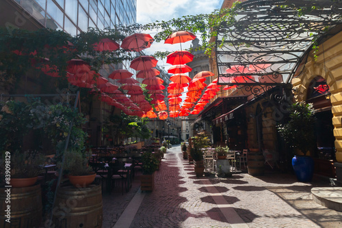 Cafe in the city center with beautiful umbrellas above it, Belgrade