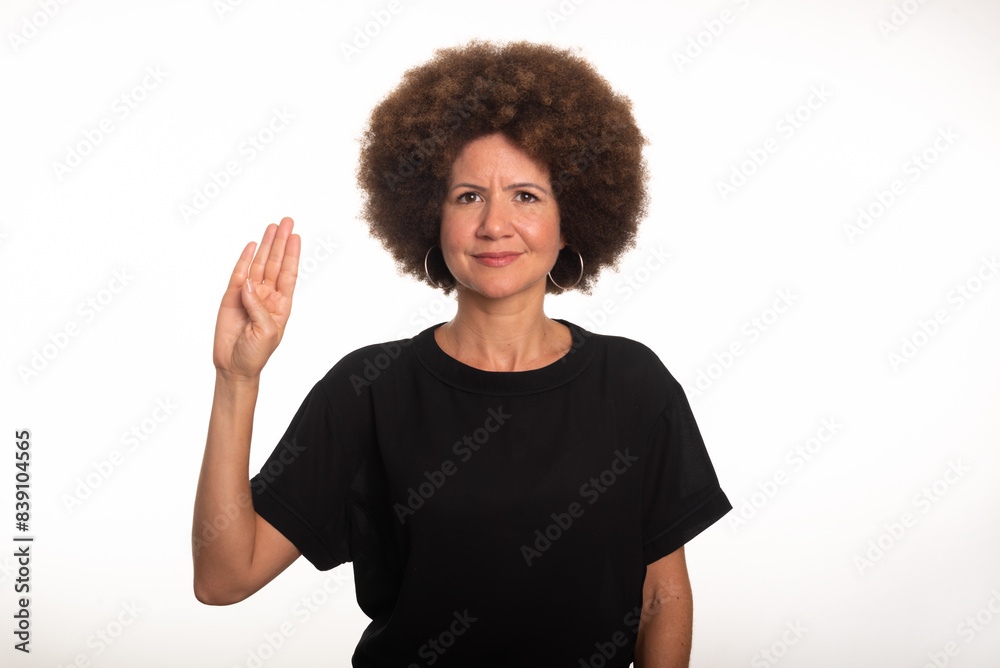Interpreter of the Brazilian sign language, Libras, making the letter B. Interpreter of the Brazilian sign language, Libras, making the letter B.