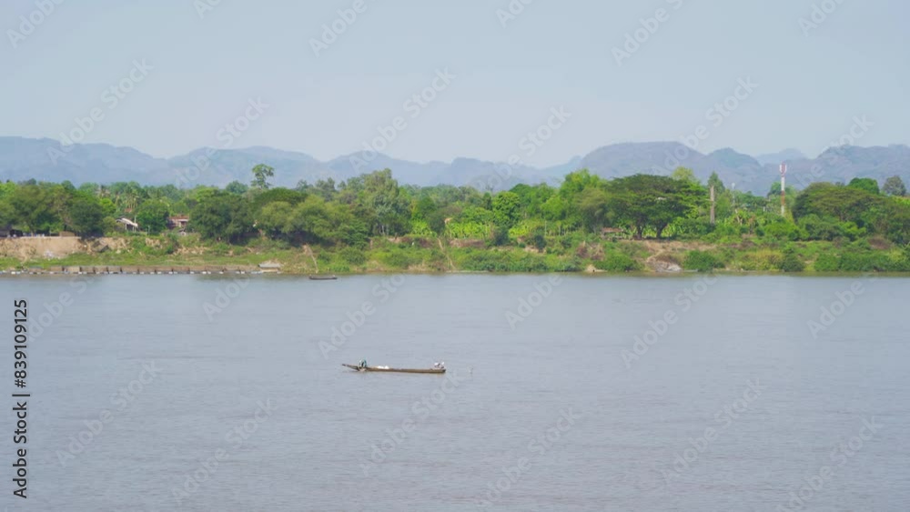 Aerial view of Mekong River with green mountain hill. Nature landscape background in Ubon Ratchathani, Thailand and Laos. Aerial view of Mekong River with green mountain hill. Nature landscape background in Ubon Ratchathani, Thailand and Laos.