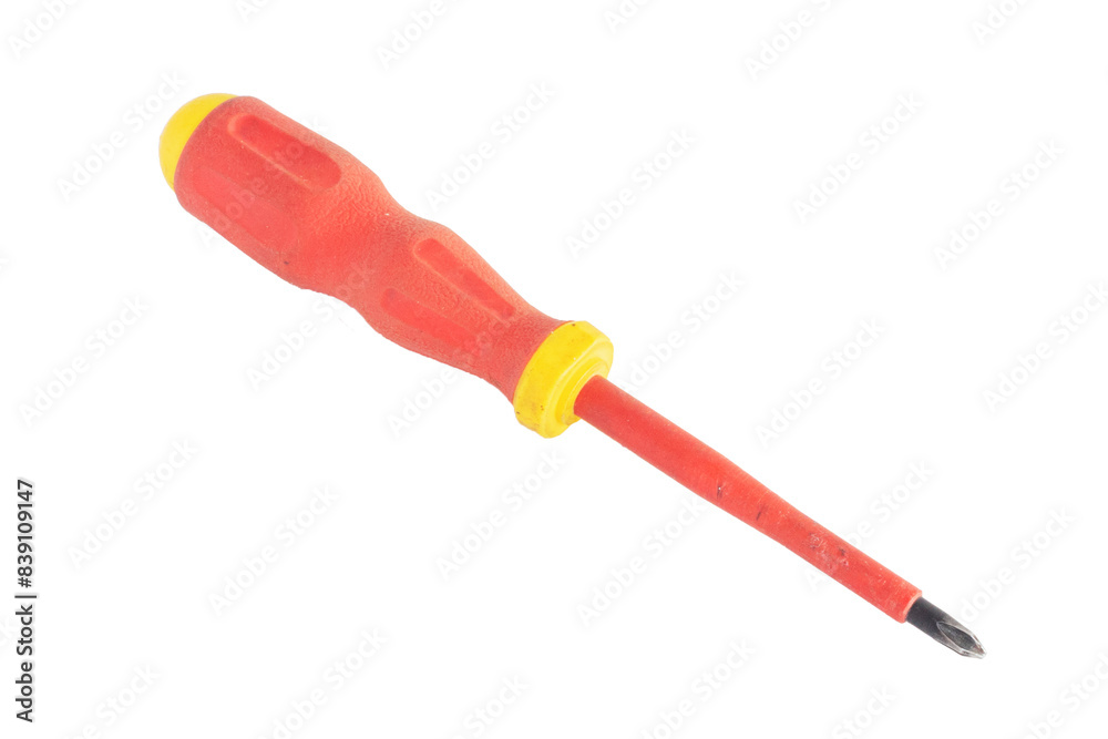 Old red and yellow screwdriver on white background. Worn working tool.