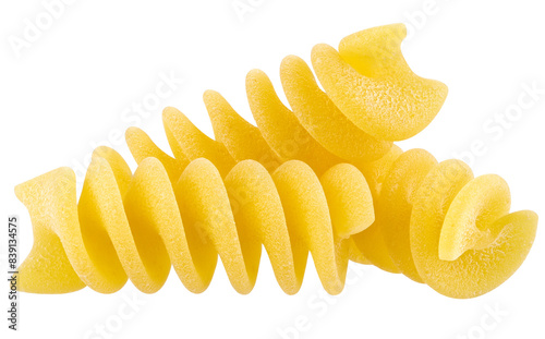 Several spiral shaped Fusilli Italian Pasta isolated on a transparent background. Close-up. photo