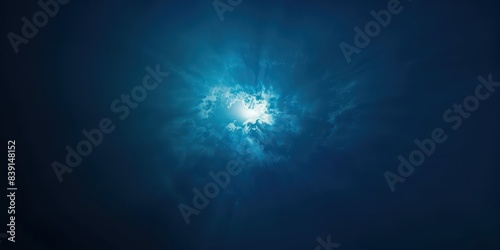 Deep blue background with a minimalist approach, featuring only a faint glow in the center.