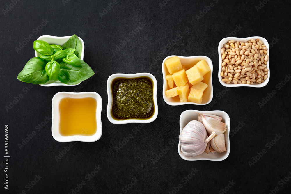 Homemade pesto sauce and ingredients. Homemade pesto sauce and ingredients.