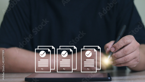 electronic signature Businessman signing electronic documents in digital documents Sign a contract to approve a business project. paperless document office