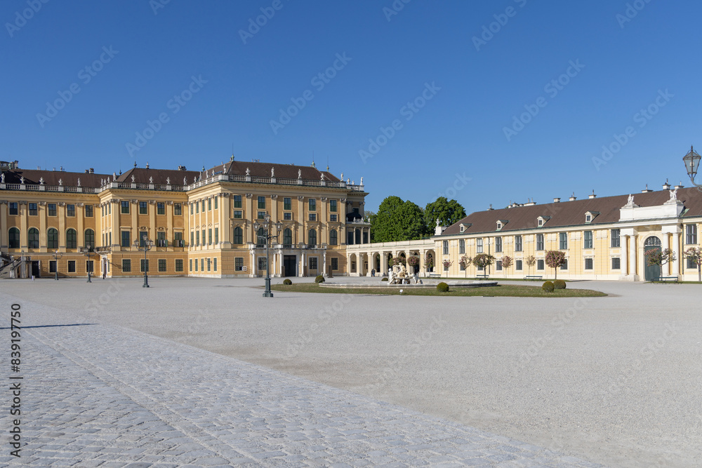 View from courtyard of facade of baroque Schonbrunn Palace located in Hietzing, Vienna, Austria
