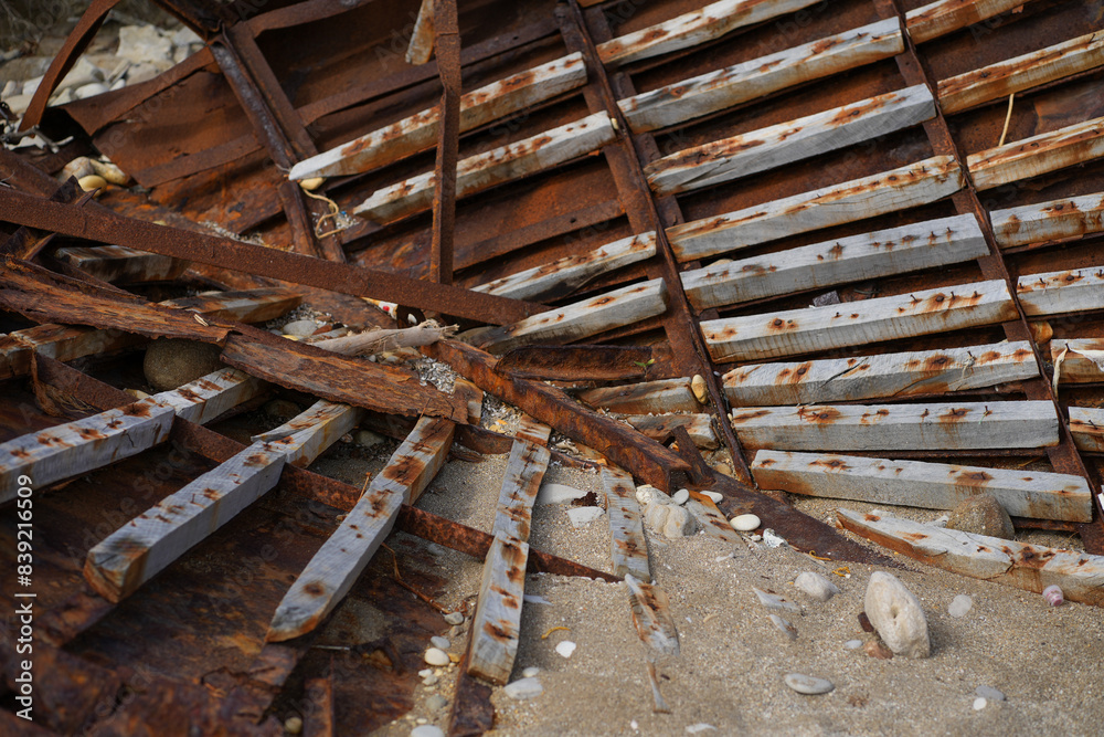 old rusty metal boat crushed at the sea bay old rusty metal boat crushed at the sea bay