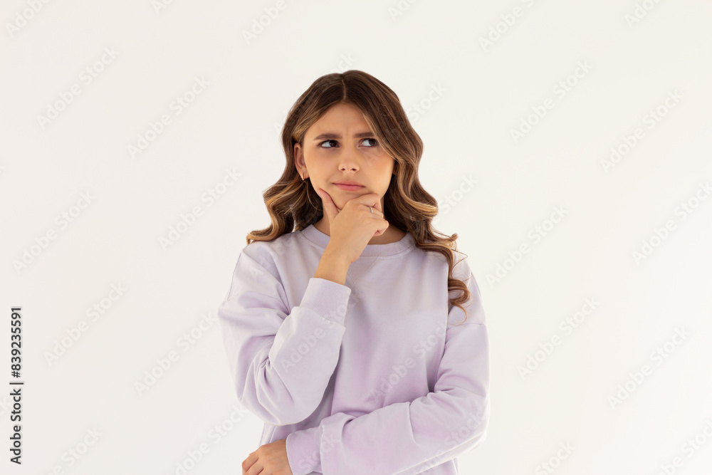Closeup photo of amazing lady looking up empty space deep thinking creative person arm on chin wear casual purple sweatshirt isolated white color background Closeup photo of amazing lady looking up empty space deep thinking creative person arm on chin wear casual purple sweatshirt isolated white color background