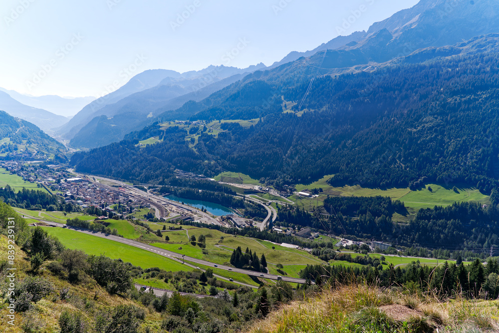 Scenic aerial view of mountain village Airolo with Leventina Valley in the Swiss Alps on a sunny late summer day. Photo taken September 10th, 2023, Gotthard, Canton Ticino, Switzerland.