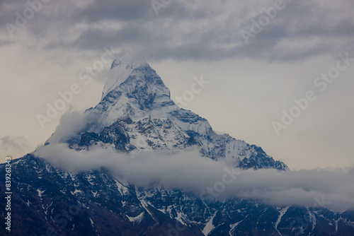 Annapurna South, Mardi Himal and Machapuchare mountain summits snow peaks in Himalayas range, Nepal. Scenic beautiful mountain landscape on the trekking path to Annapurna Basce camp hike photo