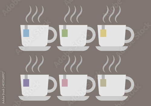 Tazas con infusión de diferentes tipos en fondo marrón.