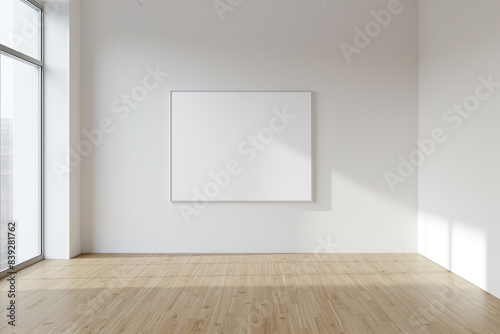 3d rendering  A blank white picture frame hanging on an empty wall with light wood floors. There is nothing in the photo  it s just a plain white wall and a simple white wooden floor