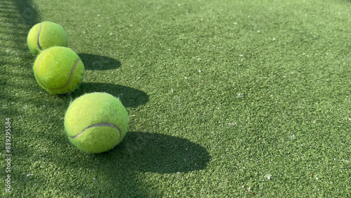  tennis ball back light shadow on tennis grass court good for background © Angelov
