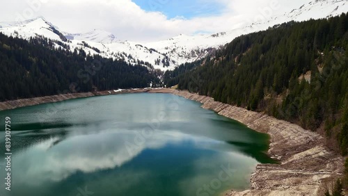 Gstaad Arnensee Lake, Swiss lake, beautiful lake set against a backdrop of mountains.hidden gem in the Swiss Alps photo