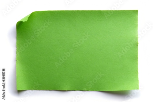 green paper on white background. paper for notes, office stationery,  office supplies