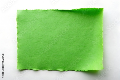 green paper on white background. paper for notes, office stationery,  office supplies