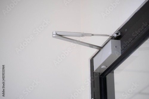 Door closer mechanism on glass door