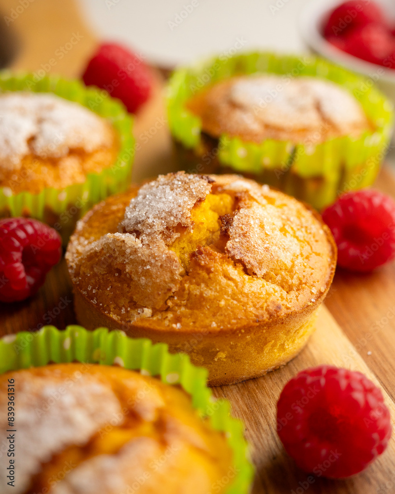 Homemade muffins with fresh raspberries in a French bakery. Homemade muffins with fresh raspberries in a French bakery.