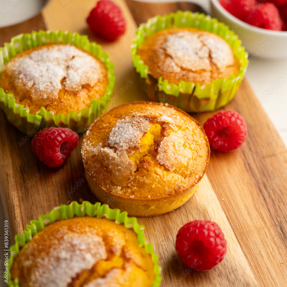 Homemade muffins with fresh raspberries in a French bakery. Homemade muffins with fresh raspberries in a French bakery.