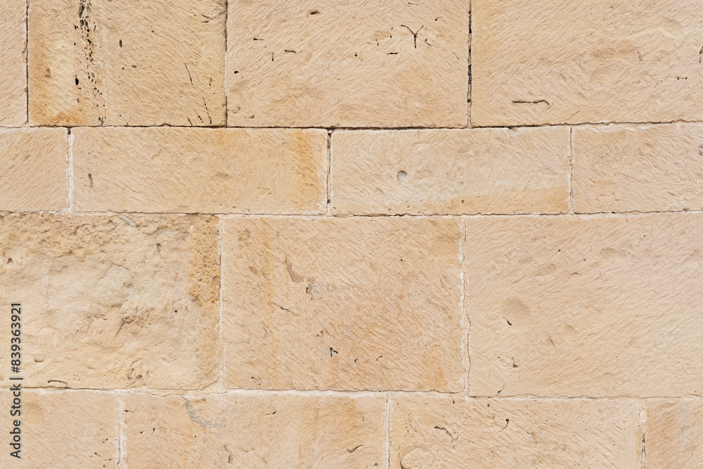 Fototapeta premium Gray and beige stone wall background