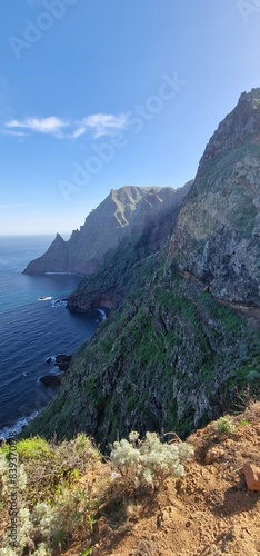 sceneries cliffs and coast of tenerife island steep rocky landscape and atlantic ocean  photo