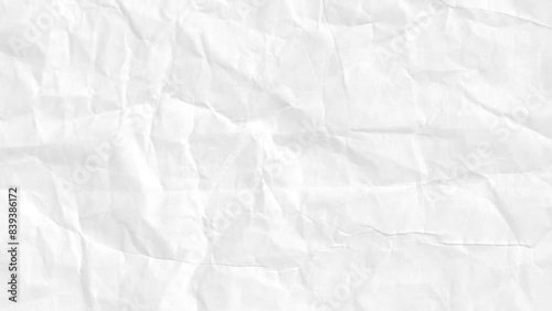A white sheet of paper with a crumpled texture, full of wrinkles and creases