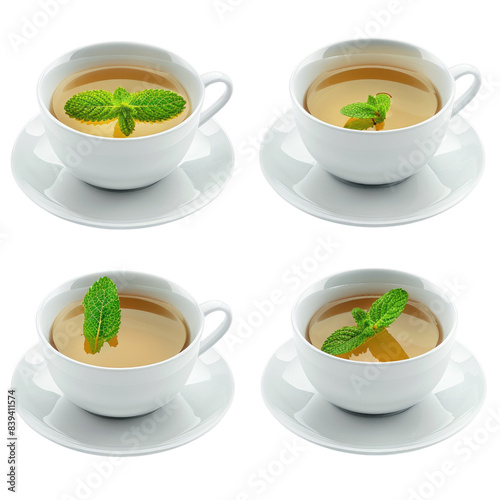 Four cups of tea with mint leaves floating on top.  The cups are white and the tea is a light yellow color.  The cups are arranged in a grid patternr in isolated on transparent background photo