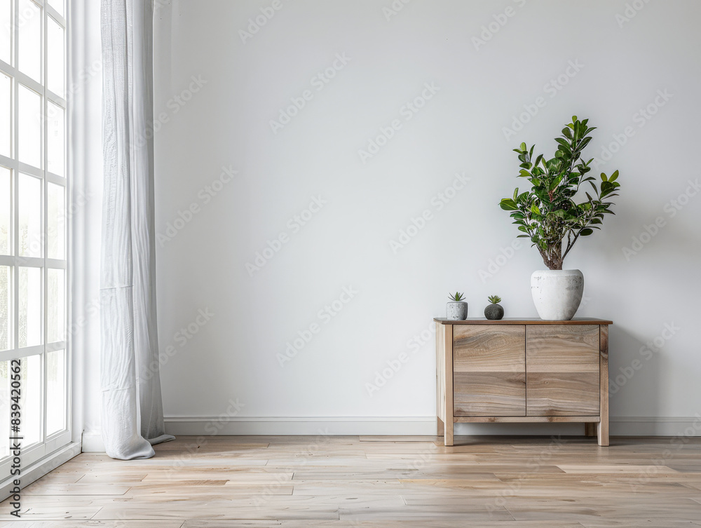 Elegant modern sideboard next to a window in an interior home decor composition. Elegant modern sideboard next to a window in an interior home decor composition.