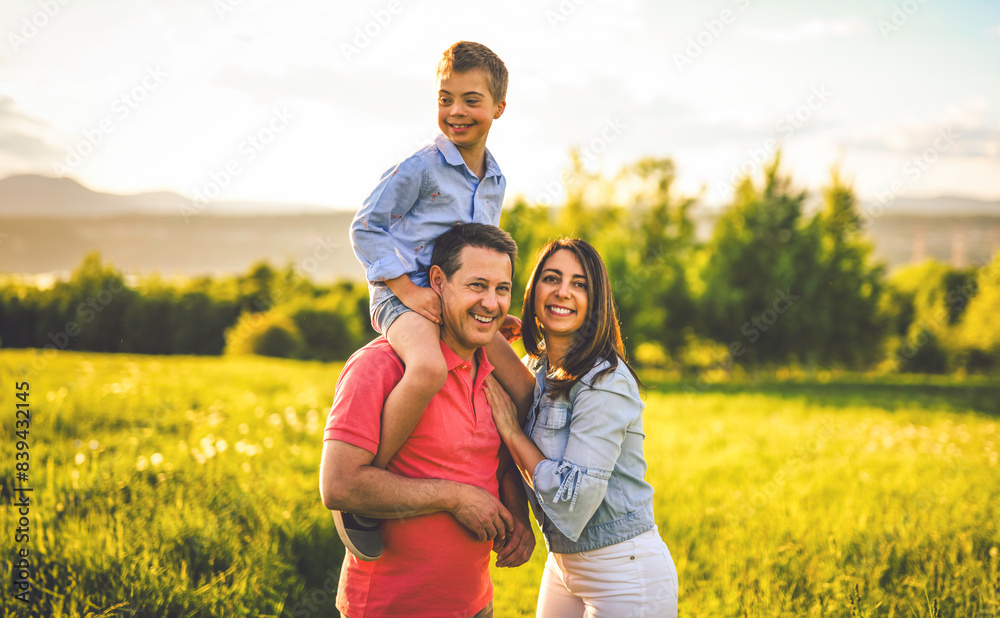 Nice family Playing on great field at Sunset Nice family Playing on great field at Sunset