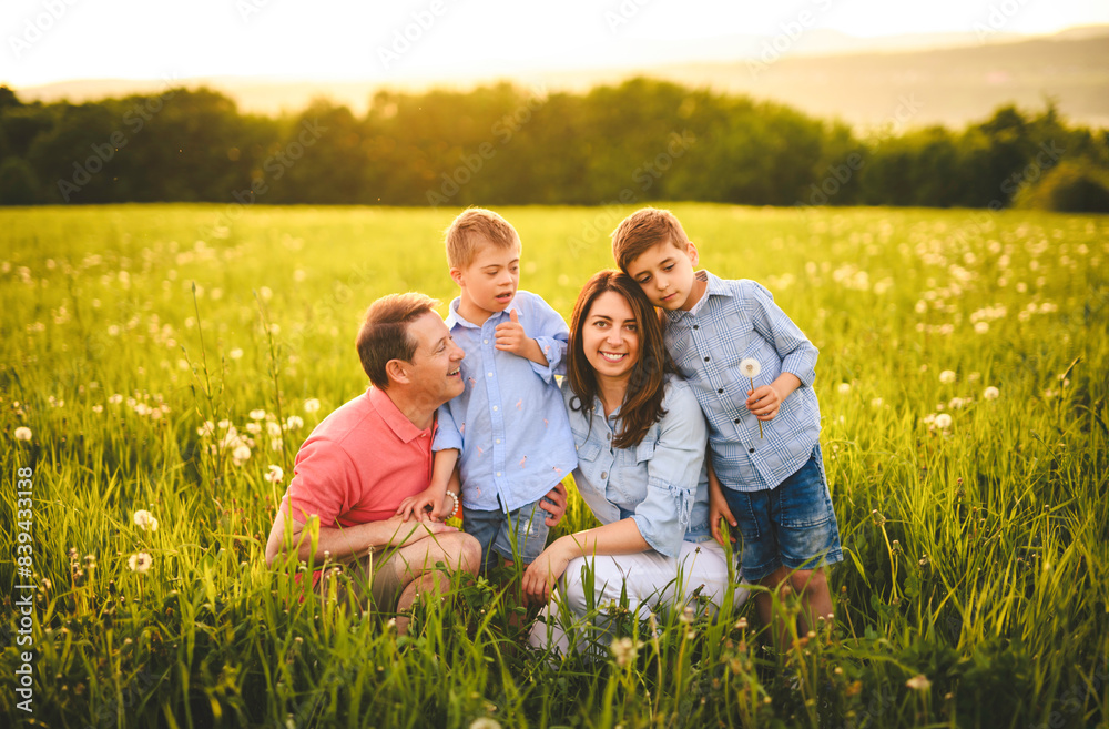 Nice family Playing on great field at Sunset Nice family Playing on great field at Sunset