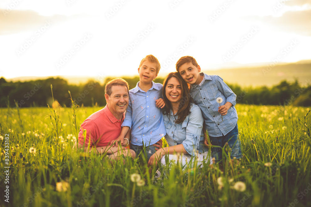 Nice family Playing on great field at Sunset Nice family Playing on great field at Sunset