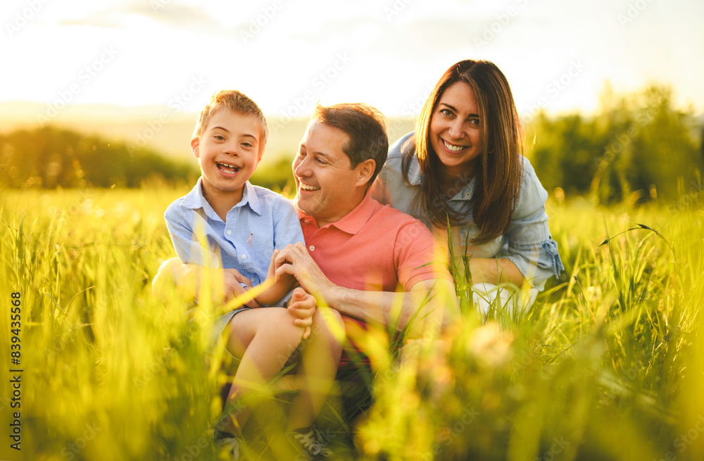 Nice family Playing on great field at Sunset Nice family Playing on great field at Sunset