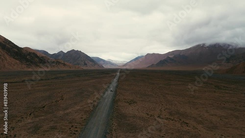 Off-road vehicle driving in Hoh Xil, no-man's land, deserted photo