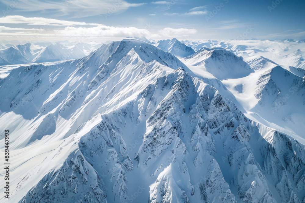 Aerial view of snowy mountain peaks, highlighting the sharp contrasts between the white snow and the dark rocky outcrops. Focus on the clean lines and dramatic shadows. Aerial view of snowy mountain peaks, highlighting the sharp contrasts between the white snow and the dark rocky outcrops. Focus on the clean lines and dramatic shadows.