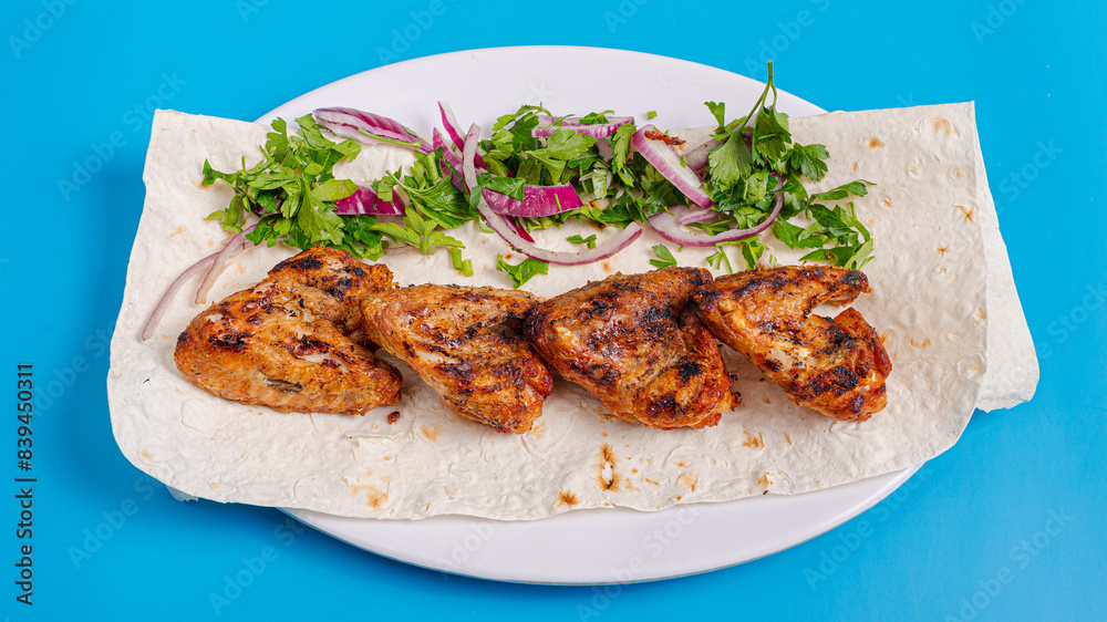 Chicken kebab on plate top view Chicken kebab on plate top view