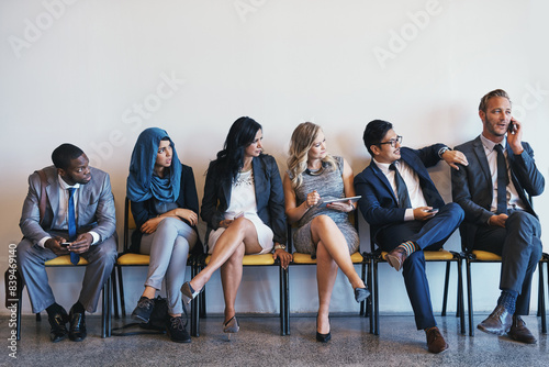 Phone call  business people and group in waiting room for recruitment  interview or hr opportunity. Chat  employees or row in office for hiring  human resources or annoyed at rude candidate on mockup