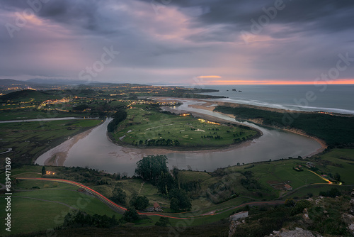 Dusk view of the meander of the Mogro estuary, Santander, Cantabria, from the top of La Picota