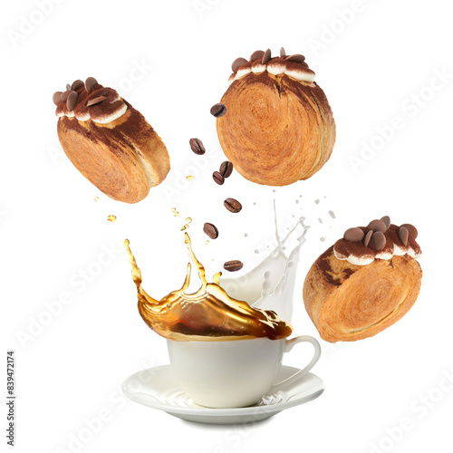 Round croissants and coffee in air on white background photo