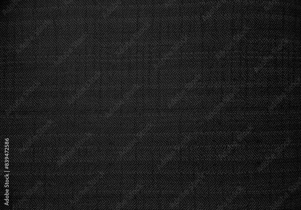 close up dark black color fabric texture. fabric herringbone, zigzag, chevron pattern. upholstery or drapery abstract textile fabric background for design. close up dark black color fabric texture. fabric herringbone, zigzag, chevron pattern. upholstery or drapery abstract textile fabric background for design.