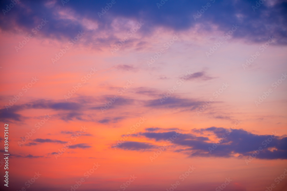 Clouds and sky in the evening,Real majestic sunrise sundown sky background with gentle colorful clouds without birds. Panoramic, big size