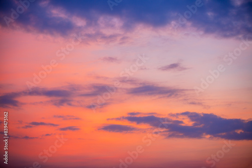 Clouds and sky in the evening,Real majestic sunrise sundown sky background with gentle colorful clouds without birds. Panoramic, big size