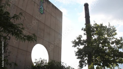 brutalist building surrounded by trees