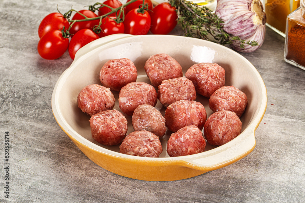 Uncooked raw beef meatball minced Uncooked raw beef meatball minced