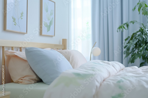 Capturing the essence of tranquility and peace, a bright bedroom with sunlight streaming through, illuminating soft bed linens and minimalist decor, creating a serene atmosphere