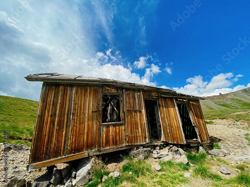 abandoned cabin in the mountains