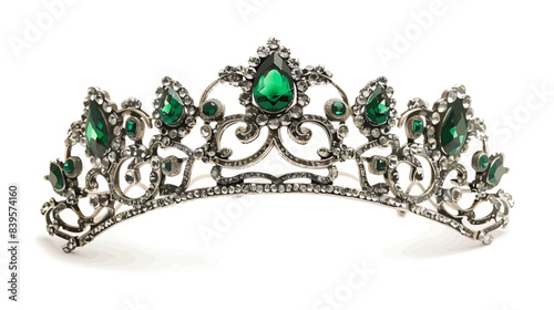 white gold tiara with green emeralds isolated on white background
