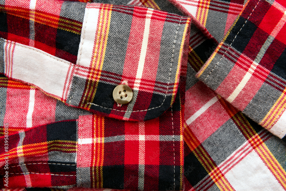 Men's shirt. Plaid shirt sleeve with buttons. Piece of clothing. Button Men's shirt. Plaid shirt sleeve with buttons. Piece of clothing. Button